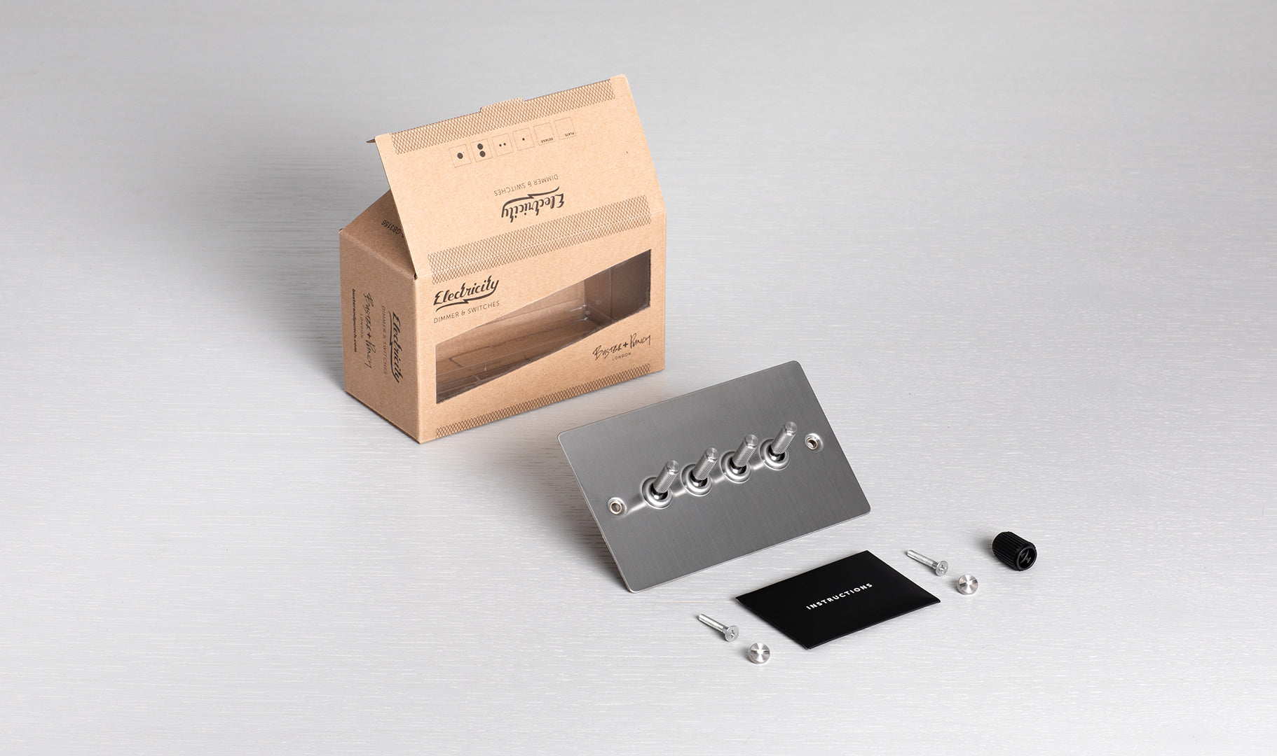 Întrerupător 4G cu 4 Comutatoare CROSS / Oțel (Model UK) - Buster & Punch